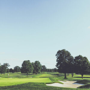 Golf course with sunny blue sky