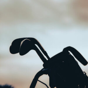 Silhouette of golf clubs in a golf back